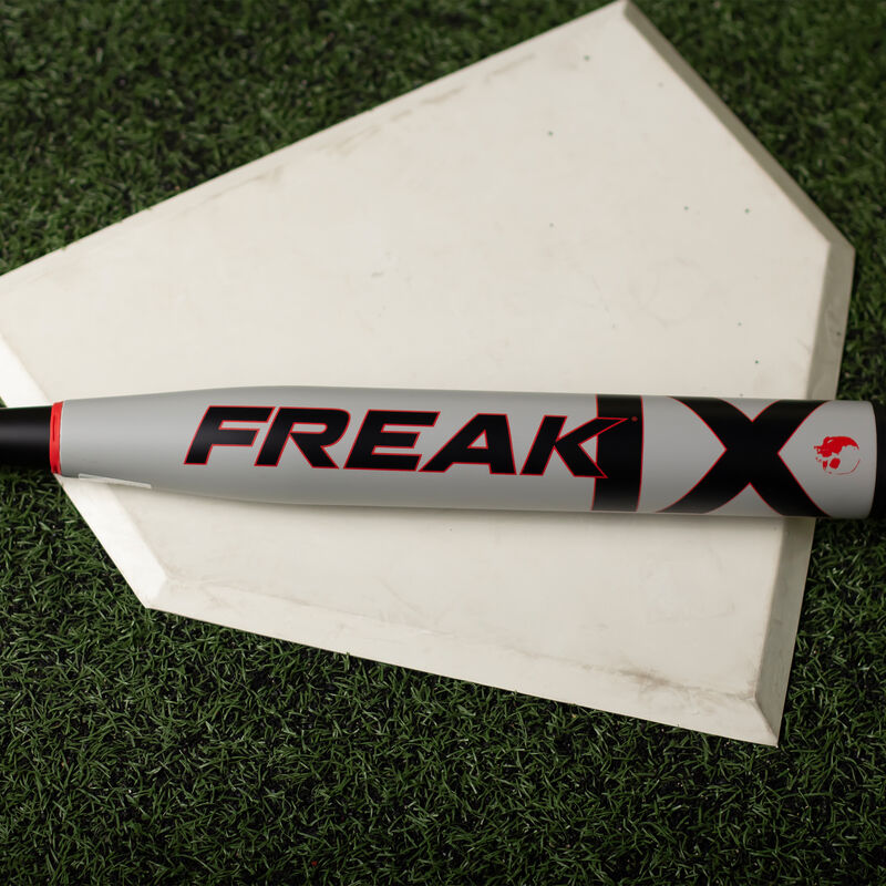 A grey Josh Riley Supermax USSSA bat on homeplate - SKU: MSU3JRX loading=