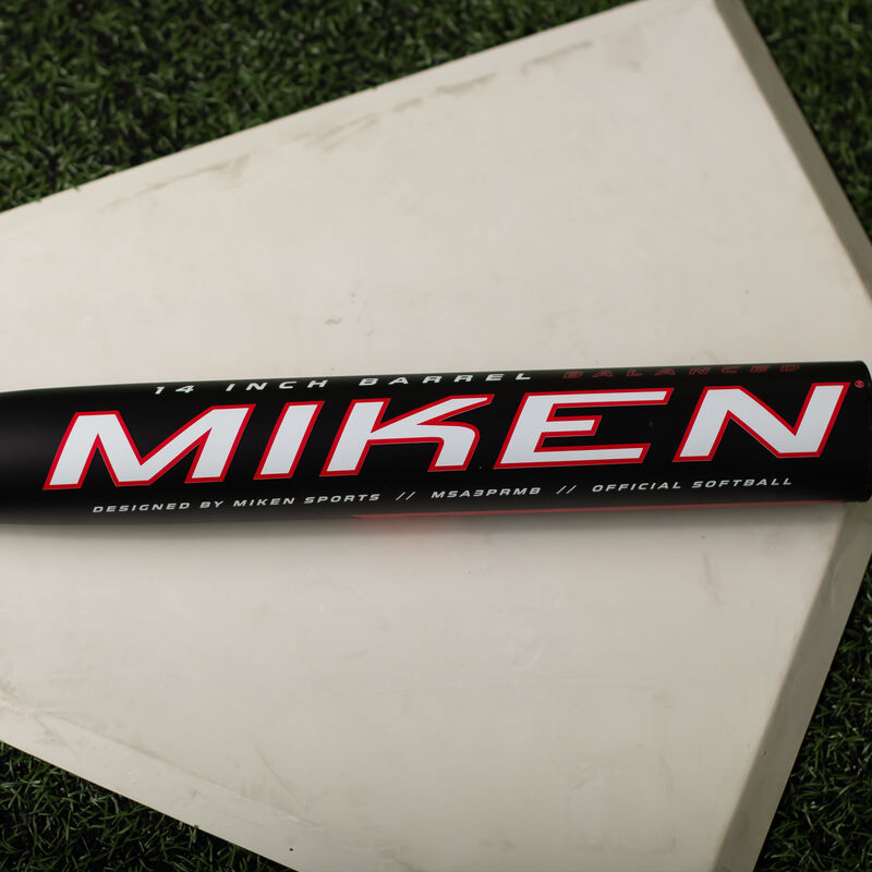 A black Miken Freak Primo balanced USA bat on home plate - SKU: MSA3PRMB loading=