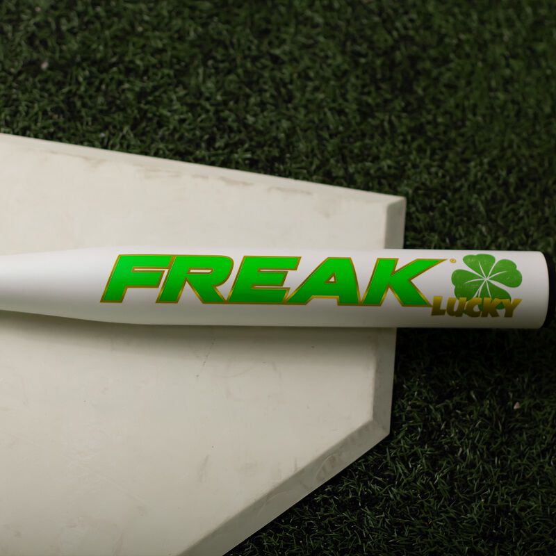 A white Freak Lucky USSSA bat on top of home plate - SKU: FSU3FLKL loading=