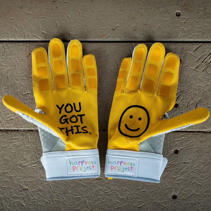 Picture of the yellow palms of a pair of white Easton x Happiness Project Ghost NX fastpitch batting gloves loading=