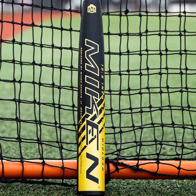 Miken logo of a Freak Gold USA bat leaning against a protective screen loading=