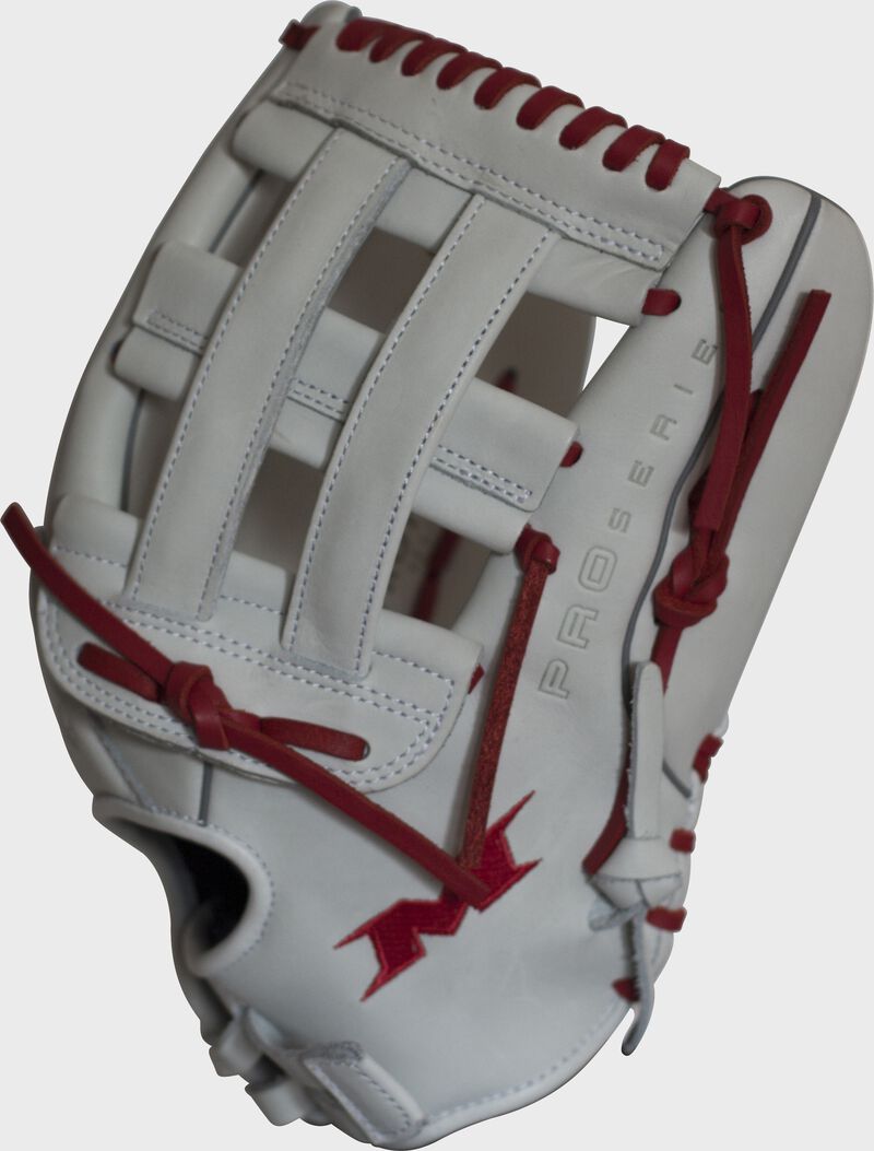 Thumb of a white/scarlet Pro Series 13.5 in softball glove with a white H web - SKU: PRO135-WS