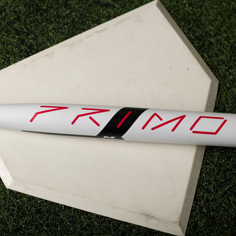 A white Maxload Freak Primo USA bat on home plate - SKU: MSA3PRML loading=